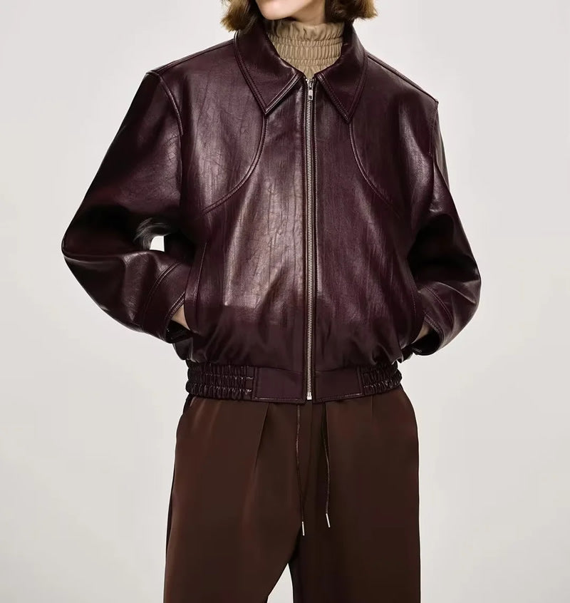 CHAMARRA BOMBER EFECTO PIEL CHOCOLATE- TINTO