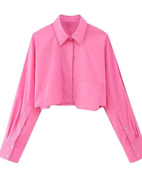 BLUSA CORTA CON BOLSAS ROSA